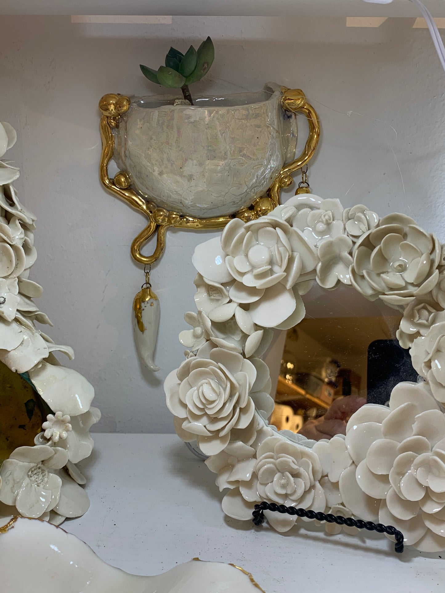 One of a kind hanging porcelain flower mirror
